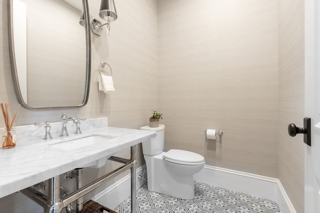 16 Grace Road Newton, MA 02459 - Photo 12 of 36 a bathroom with a sink toilet and mirror