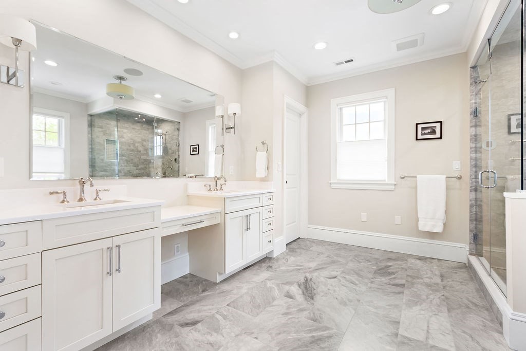 16 Grace Road Newton, MA 02459 - Photo 15 of 36 a large bathroom with a granite countertop sink mirror and a