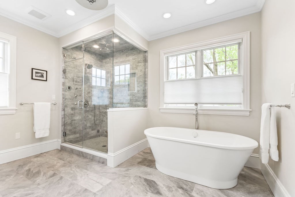 16 Grace Road Newton, MA 02459 - Photo 16 of 36 a white bath tub sitting next to a window