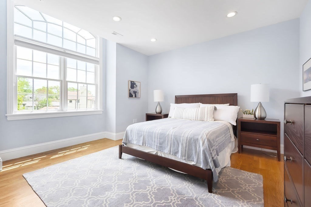 16 Grace Road Newton, MA 02459 - Photo 18 of 36 a bedroom with a bed and a window