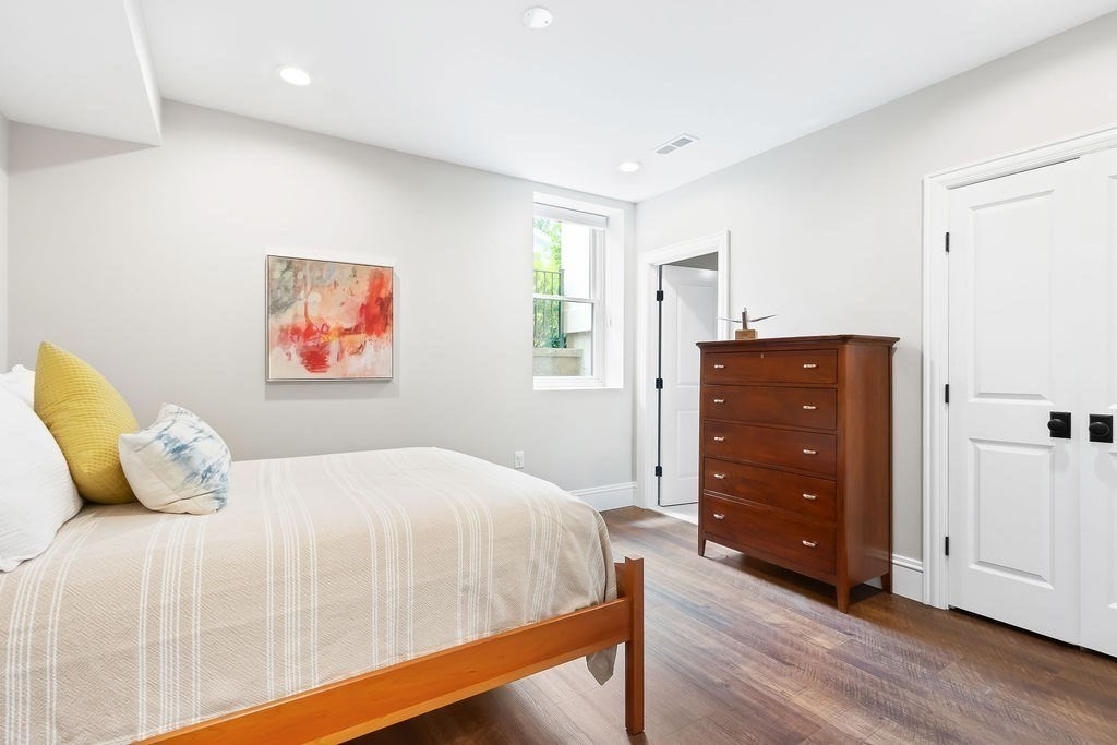 16 Grace Road Newton, MA 02459 - Photo 27 of 36 a bedroom with a bed and a dresser