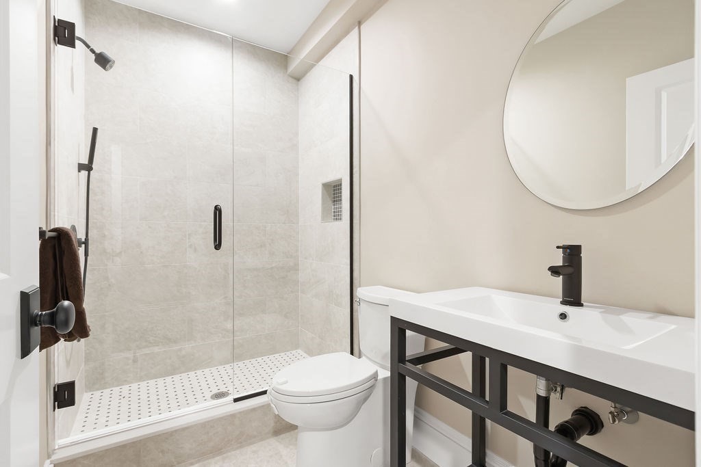 16 Grace Road Newton, MA 02459 - Photo 28 of 36 a bathroom with a sink toilet and shower