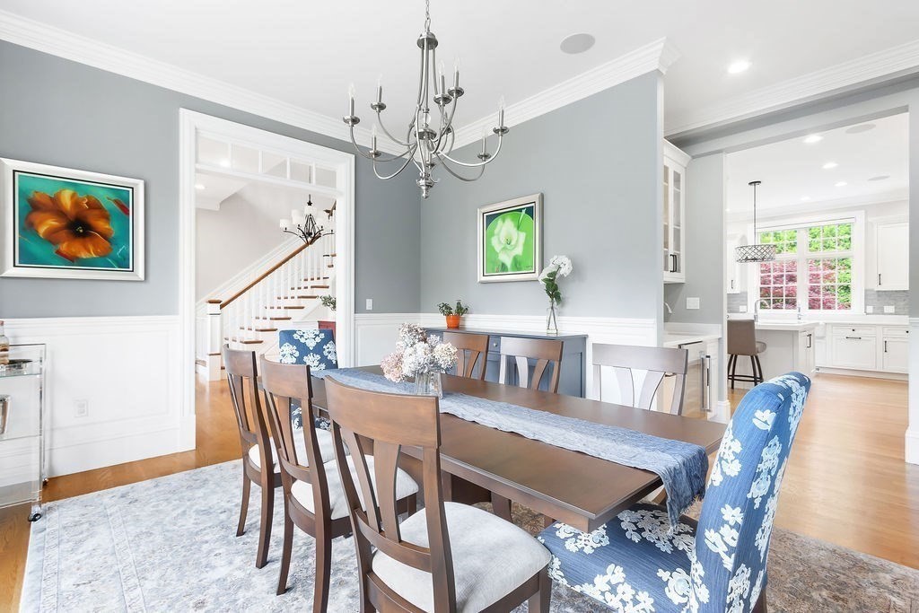 16 Grace Road Newton, MA 02459 - Photo 8 of 36 a view of a dining room with furniture a chandelier and wooden floor