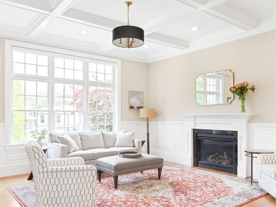 16 Grace Road Newton, MA 02459 - Photo 9 of 36 a living room with furniture a fireplace and a table