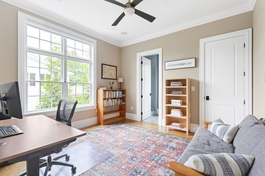 16 Grace Road Newton, MA 02459 - Photo 10 of 36 a living room with furniture and a window