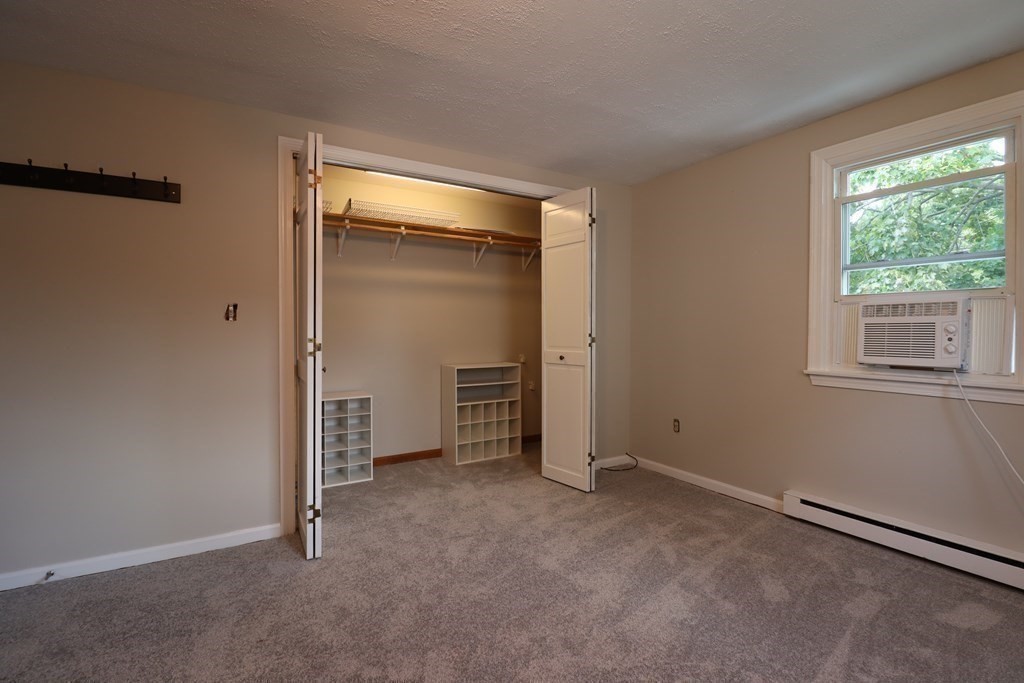 31 Longview Way Peabody, MA 01960 - Photo 23 of 42 an empty room with windows and closet