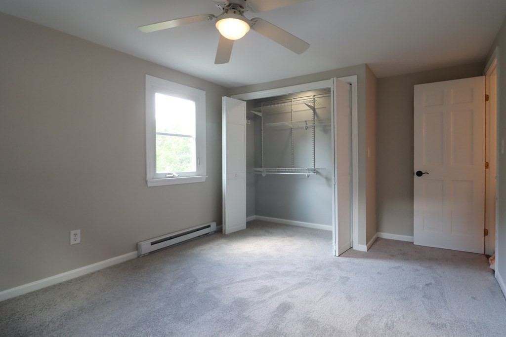 31 Longview Way Peabody, MA 01960 - Photo 25 of 42 an empty room with closet and windows