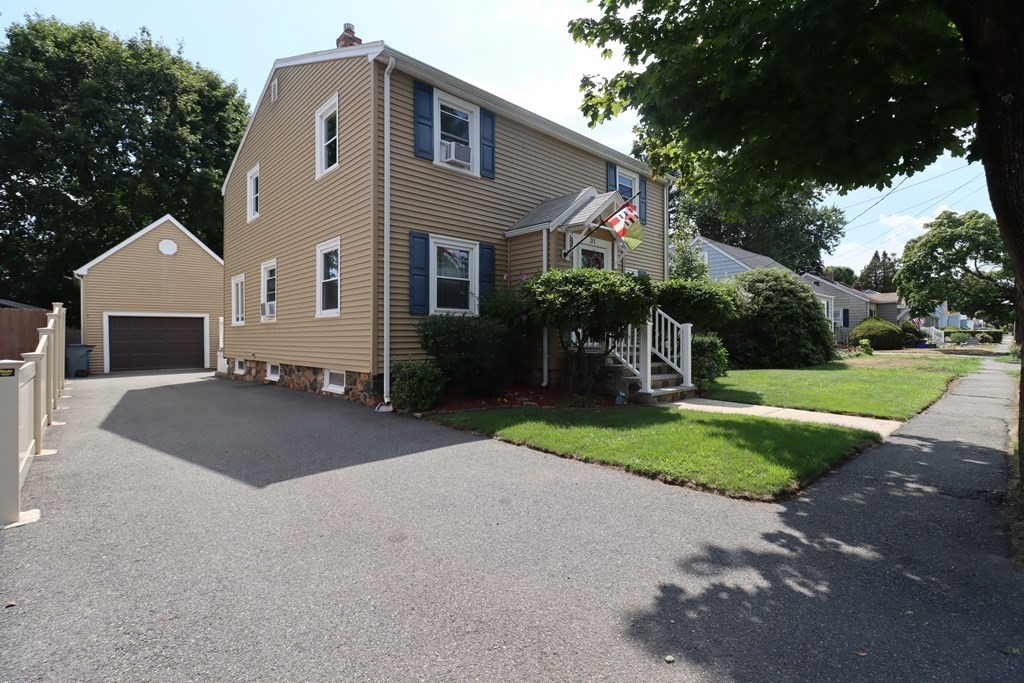 31 Longview Way Peabody, MA 01960 - Photo 3 of 42 a front view of house with yard and green space
