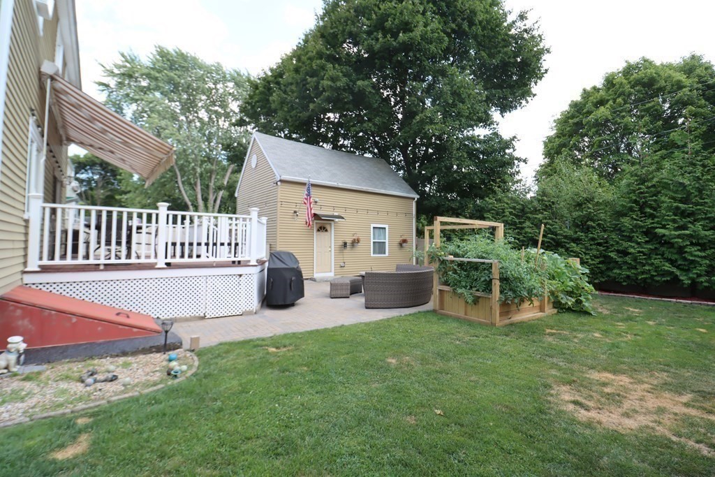 31 Longview Way Peabody, MA 01960 - Photo 33 of 42 a view of a chair and table in backyard