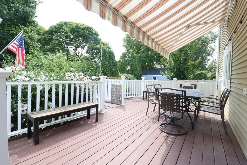 31 Longview Way Peabody, MA 01960 - Photo 5 of 42 a view of a chairs and table on the wooden floor