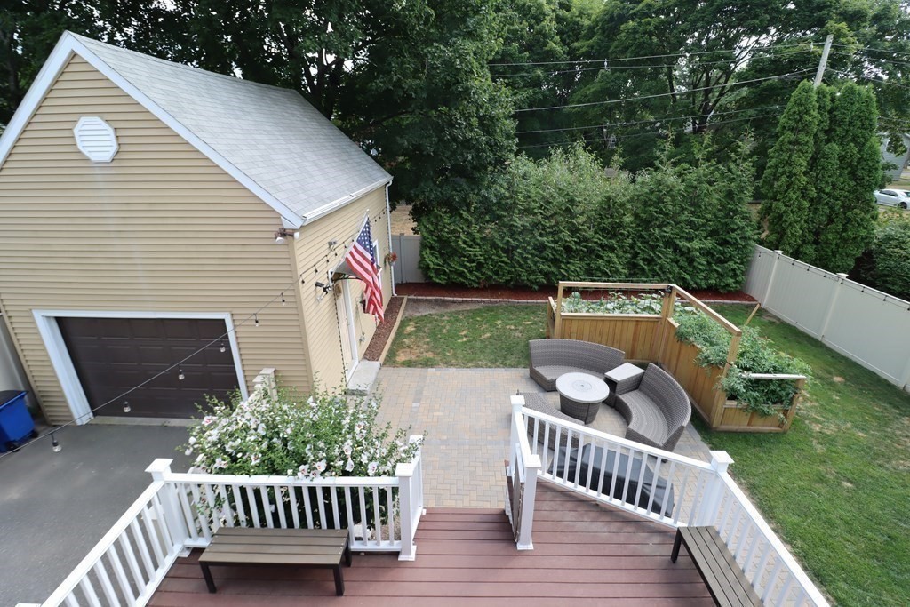 31 Longview Way Peabody, MA 01960 - Photo 7 of 42 a view of deck with furniture and garden