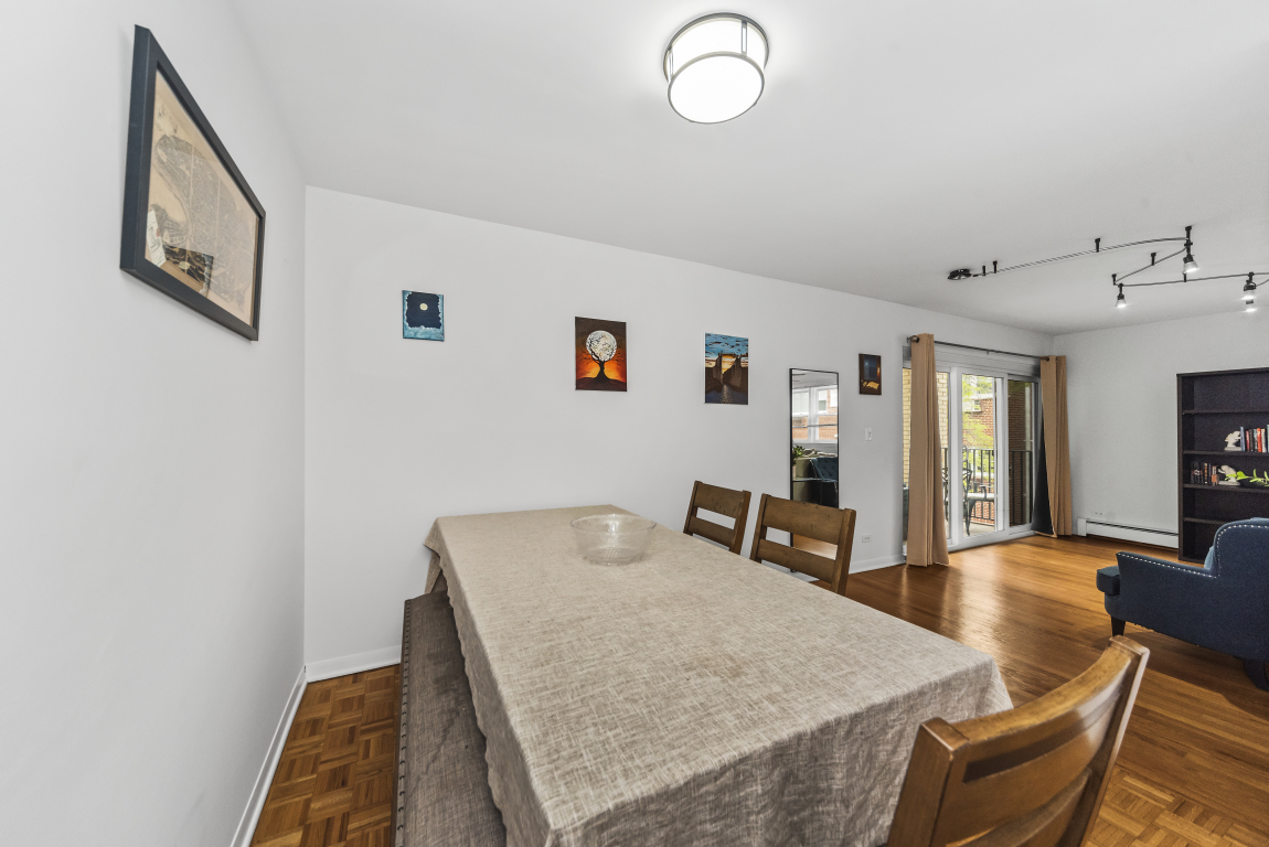 2141 Ridge Avenue, Unit 2B Evanston, IL 60201 - Photo 7 of 17 a living room with furniture and wooden floor