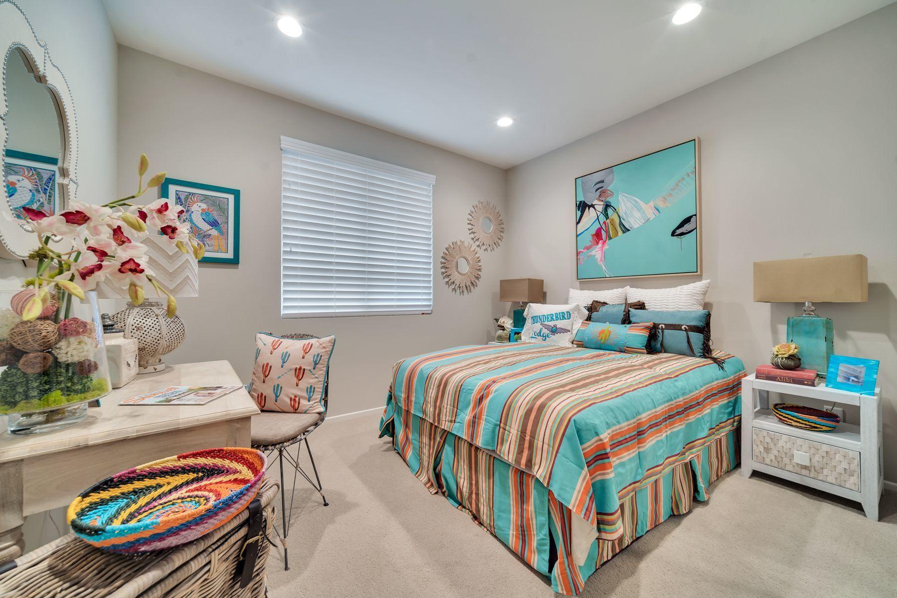 1748 East Holguin Street Lancaster, CA 93535 - Photo 14 of 20 a bedroom with bed and a window