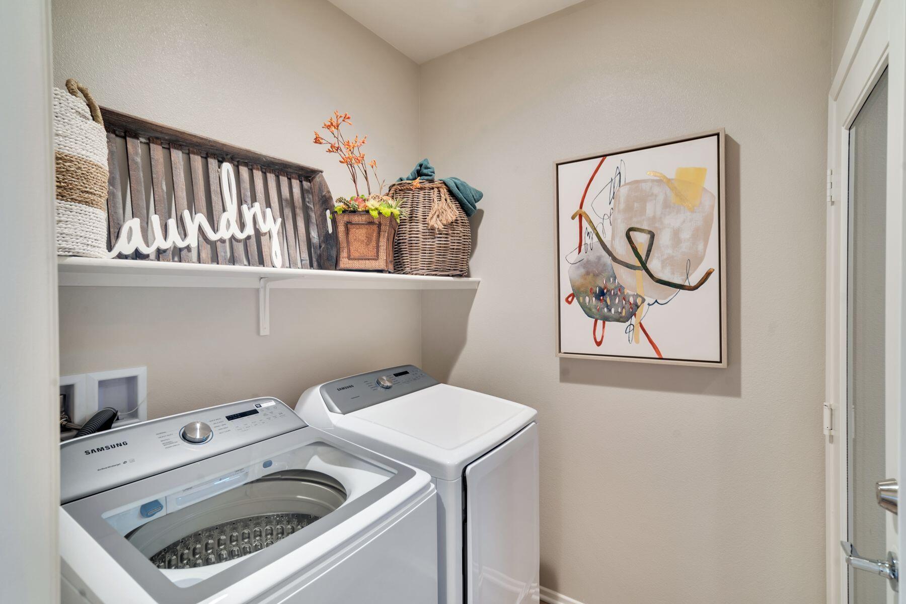 1748 East Holguin Street Lancaster, CA 93535 - Photo 17 of 20 a utility room with dryer and washer