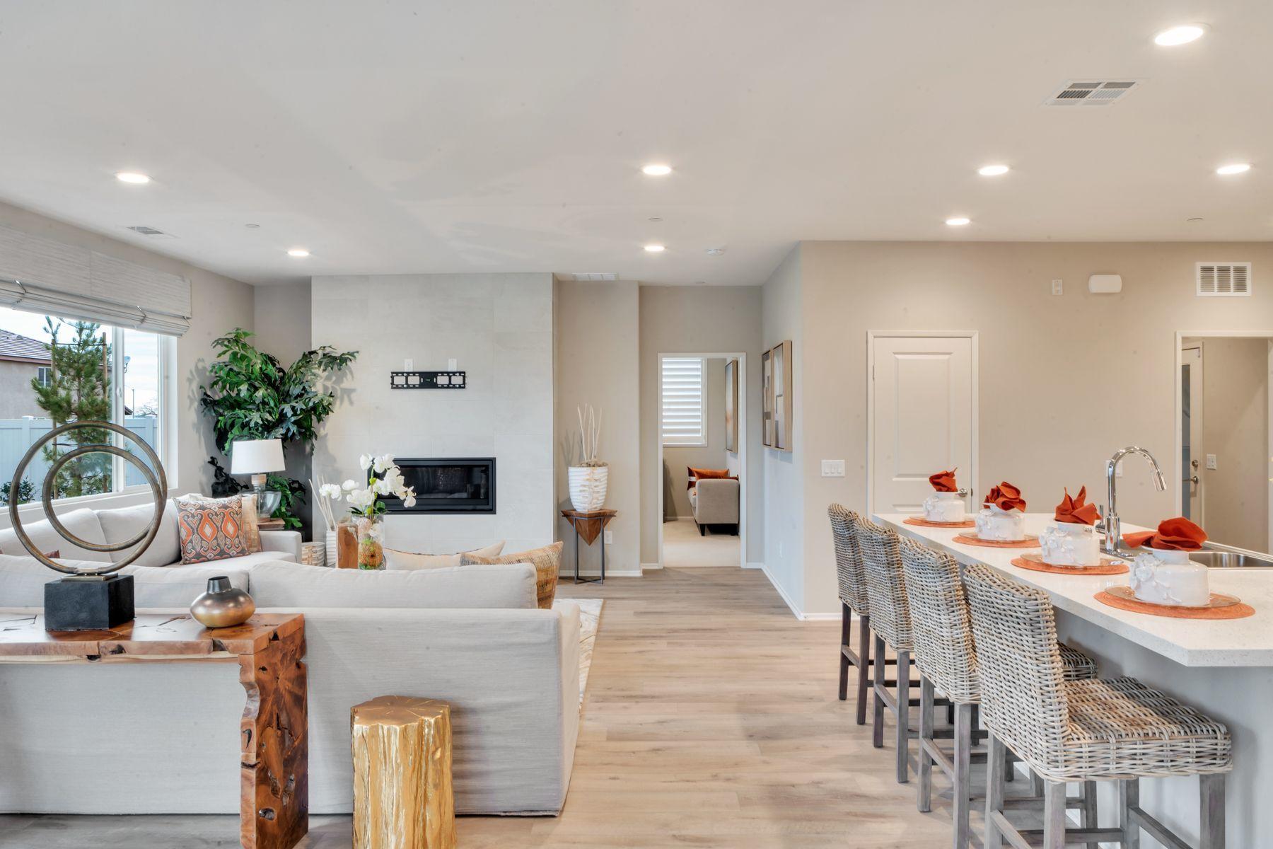 1748 East Holguin Street Lancaster, CA 93535 - Photo 5 of 20 a view of a kitchen and dining room