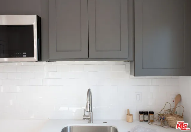 a reading room with furniture and a window