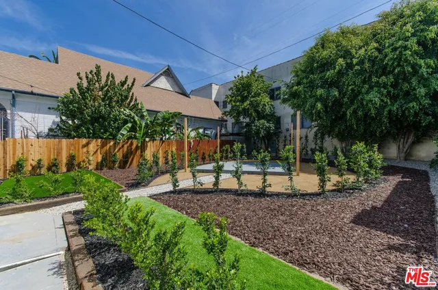 a view of water pond with yard