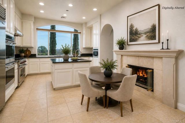 a large spacious bathroom with a large tub and shower