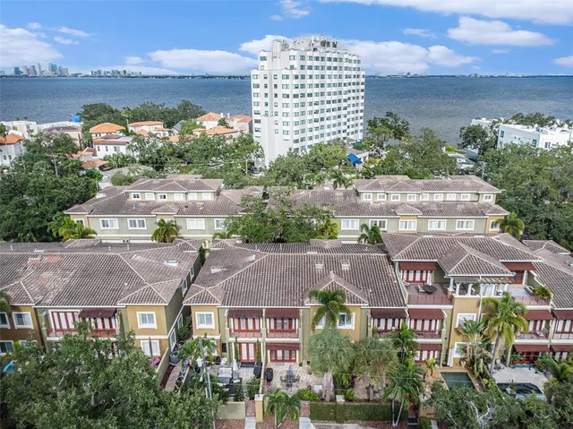 a view of a city with a building in the background