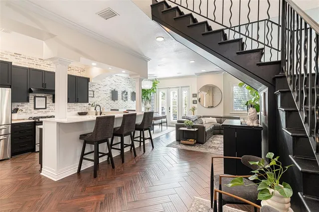 a group of people sitting in a living room