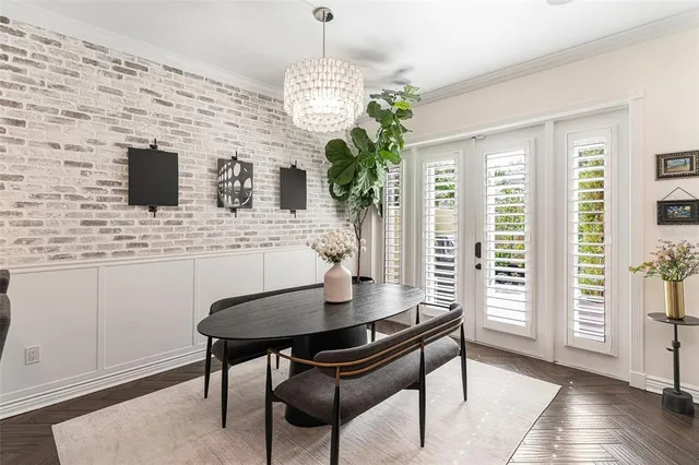 a view of a dining room with furniture and window