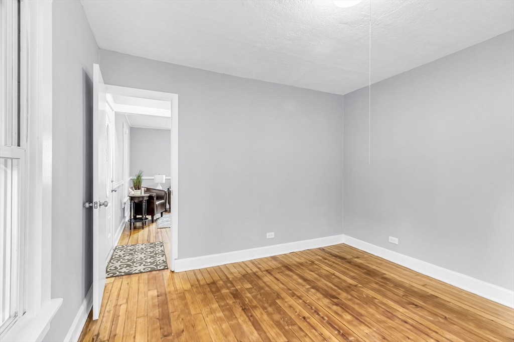 125 Verge Street Springfield, MA 01129 - Photo 21 of 42 a view of a bedroom from a hallway