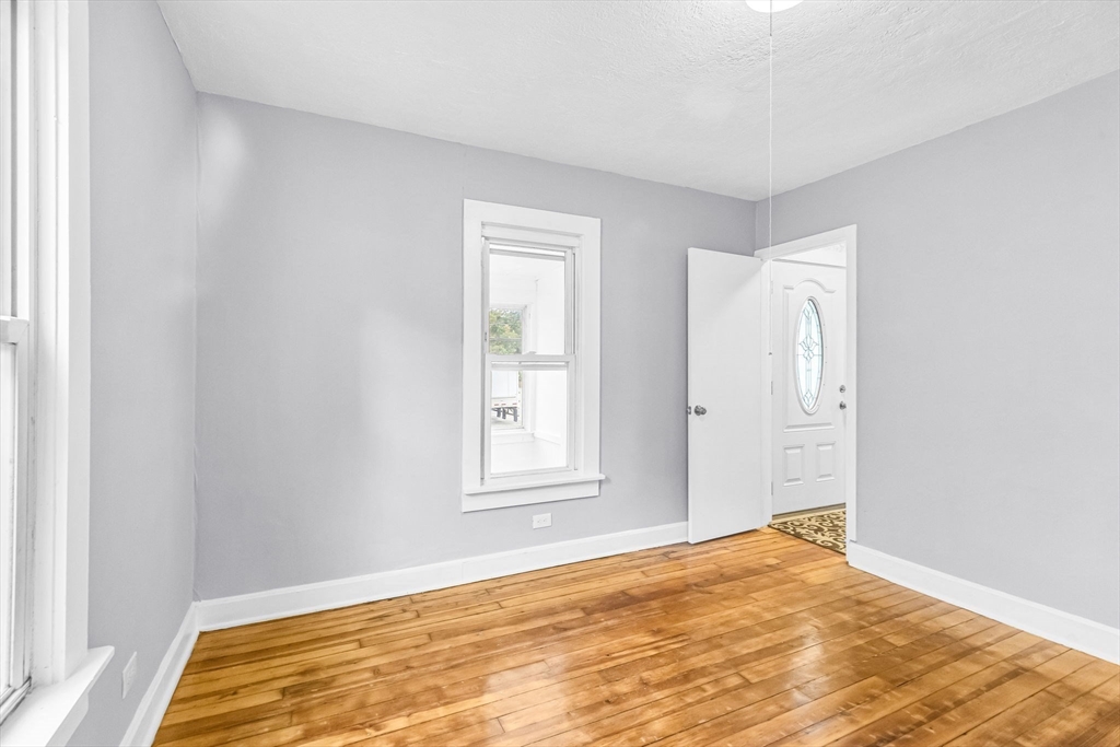 125 Verge Street Springfield, MA 01129 - Photo 22 of 42 a view of empty room with wooden floor