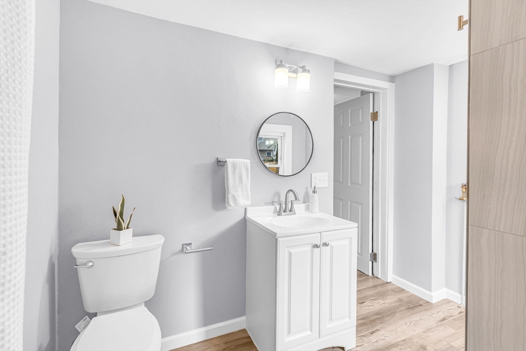 125 Verge Street Springfield, MA 01129 - Photo 25 of 42 a bathroom with a toilet sink and mirror