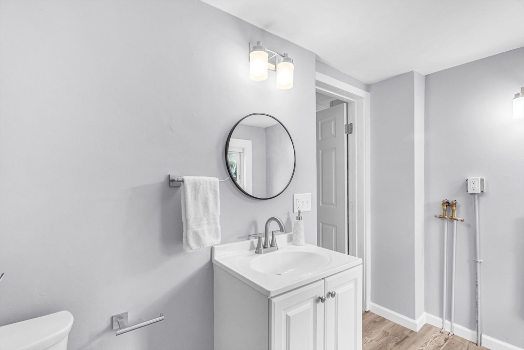 125 Verge Street Springfield, MA 01129 - Photo 26 of 42 a bathroom with a sink and a mirror