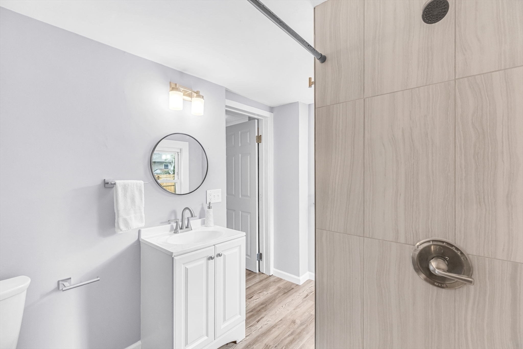 125 Verge Street Springfield, MA 01129 - Photo 27 of 42 a bathroom with a sink and a mirror