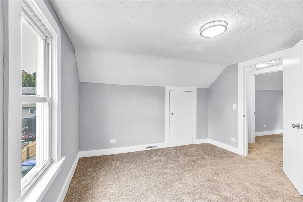 125 Verge Street Springfield, MA 01129 - Photo 29 of 42 a view of an empty room and window