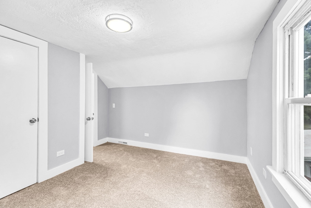 125 Verge Street Springfield, MA 01129 - Photo 35 of 42 an empty room with windows and closet