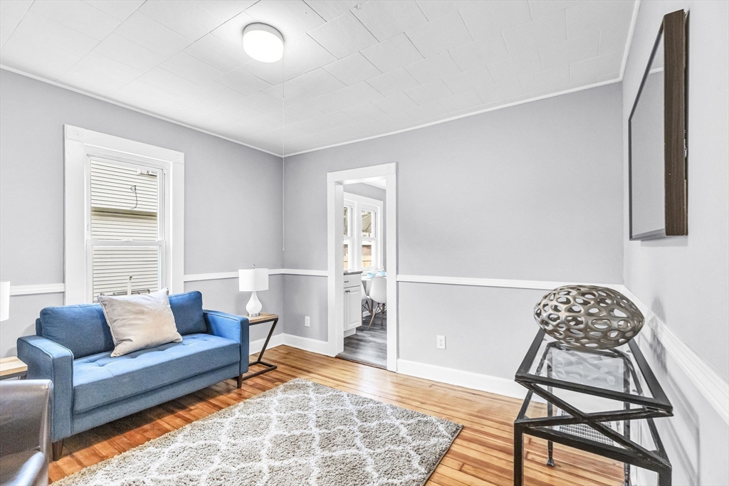 125 Verge Street Springfield, MA 01129 - Photo 8 of 42 a living room with furniture and a rug