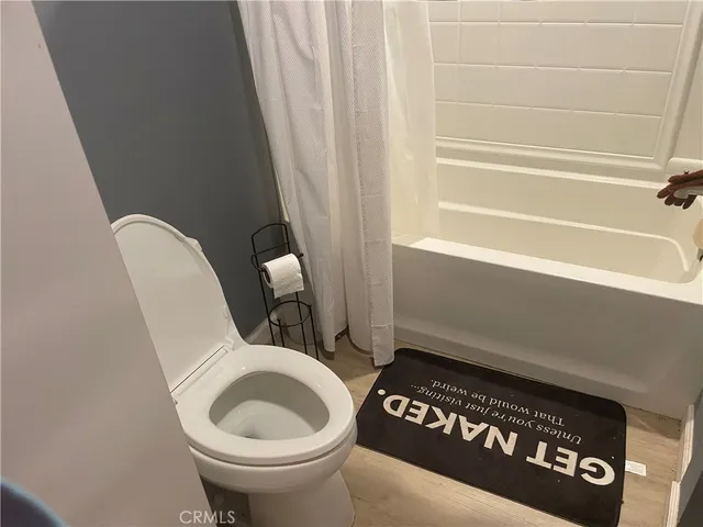 a bathroom with a toilet and a sink