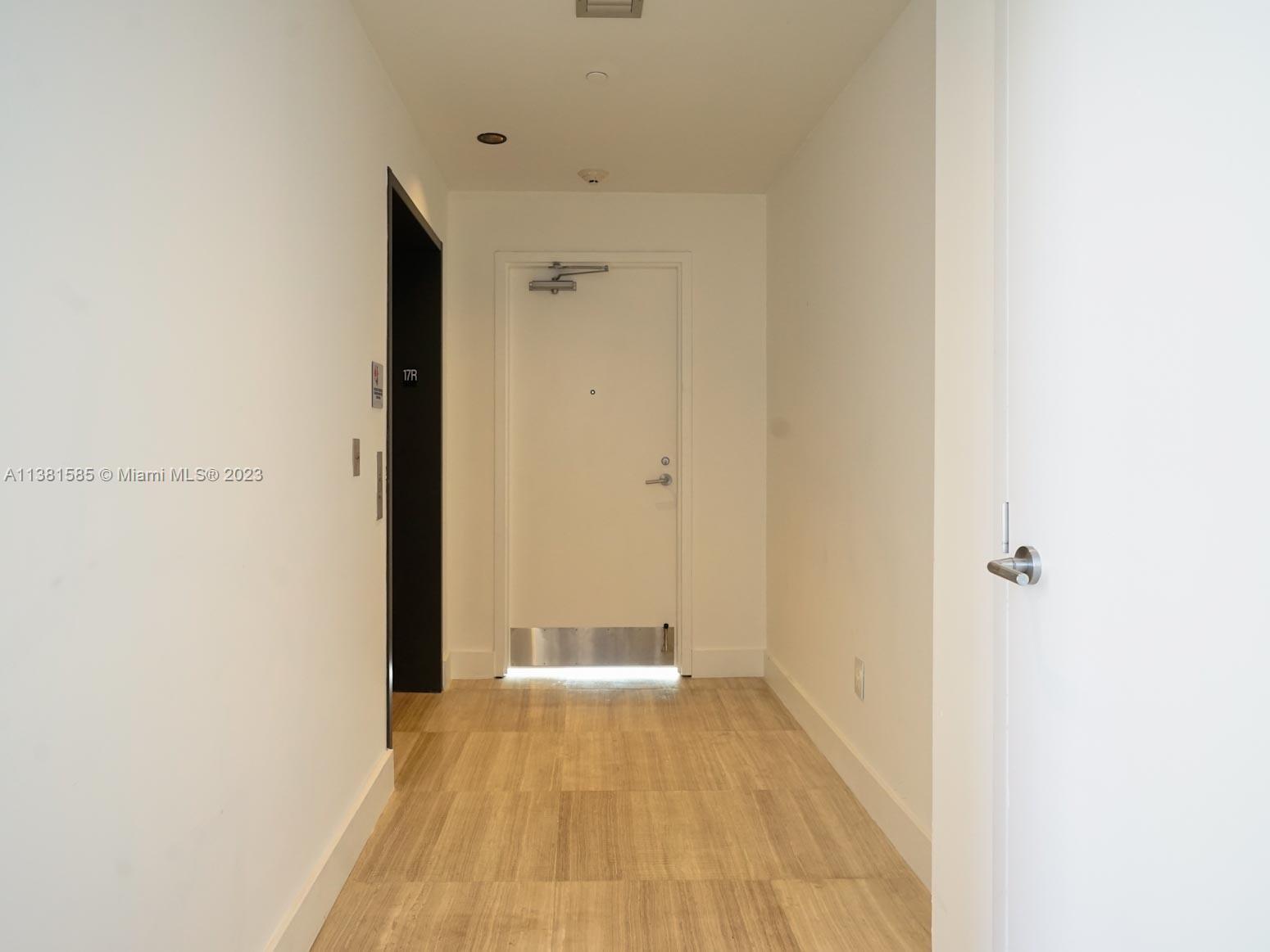 Edgewater Miami, FL 33137 - Photo 4 of 42 a view of a room with a wooden floor