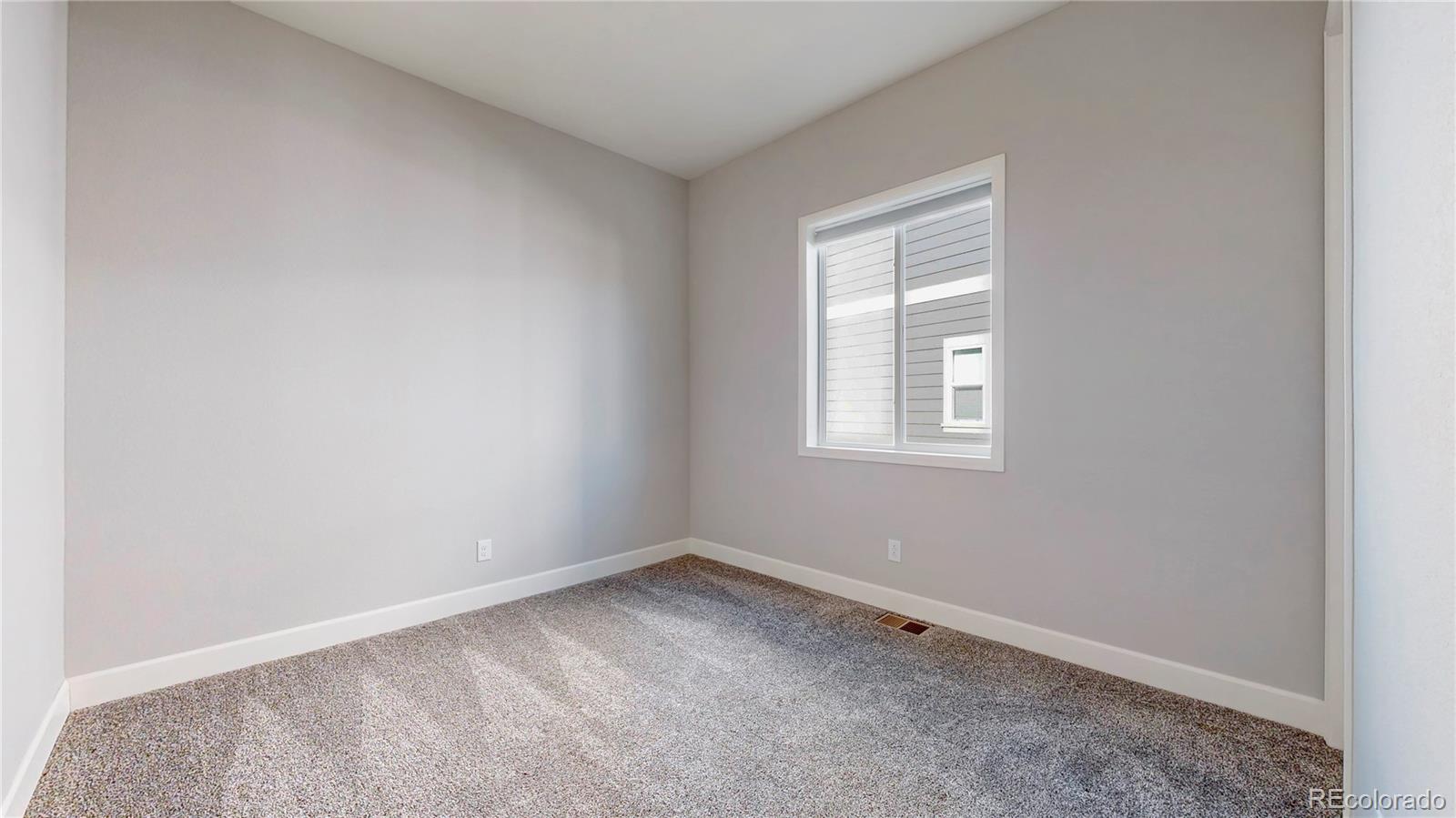 20249 Terrace View Drive Parker, CO 80134 - Photo 22 of 38 an empty room with a window