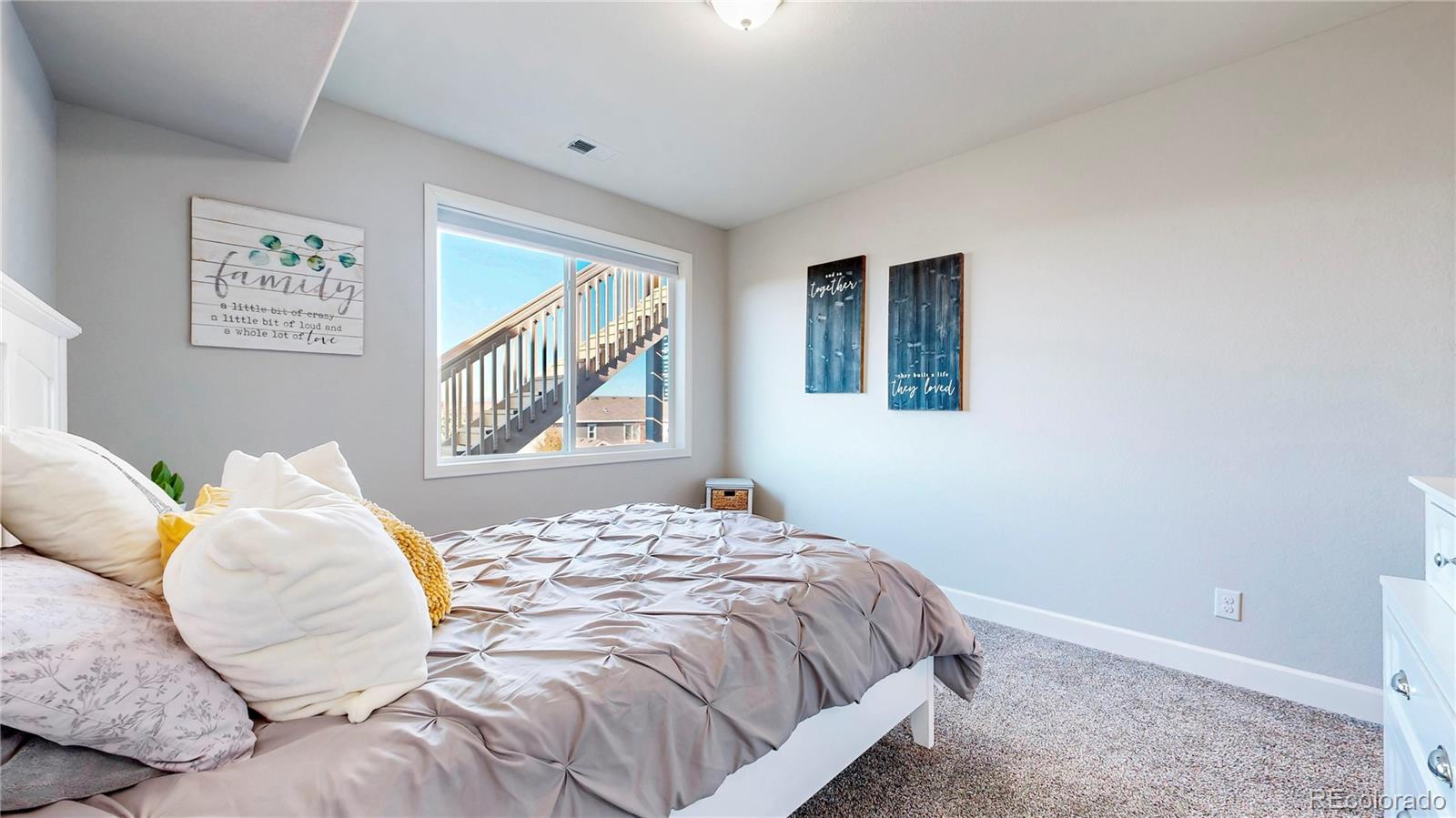 20249 Terrace View Drive Parker, CO 80134 - Photo 26 of 38 a bedroom with a bed and a window