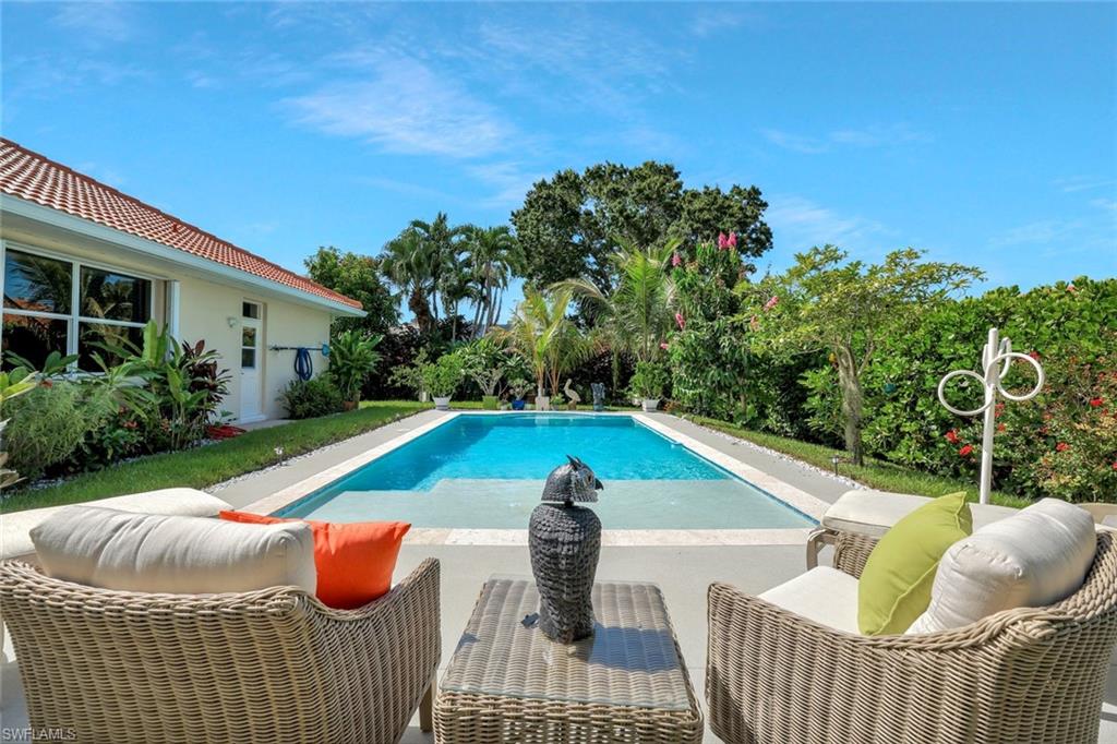 186 Muirfield Circle Naples, FL 34113 - Photo 32 of 32 a view of outdoor space and patio