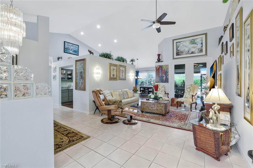 186 Muirfield Circle Naples, FL 34113 - Photo 5 of 32 a living room with furniture