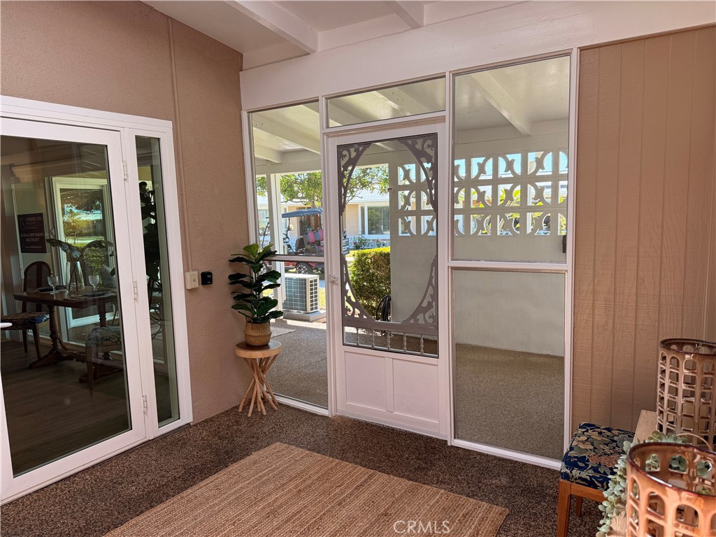 13560 Medinac Lane, Unit 102B Seal Beach, CA 90740 - Photo 19 of 24 a view of a room with gym equipment