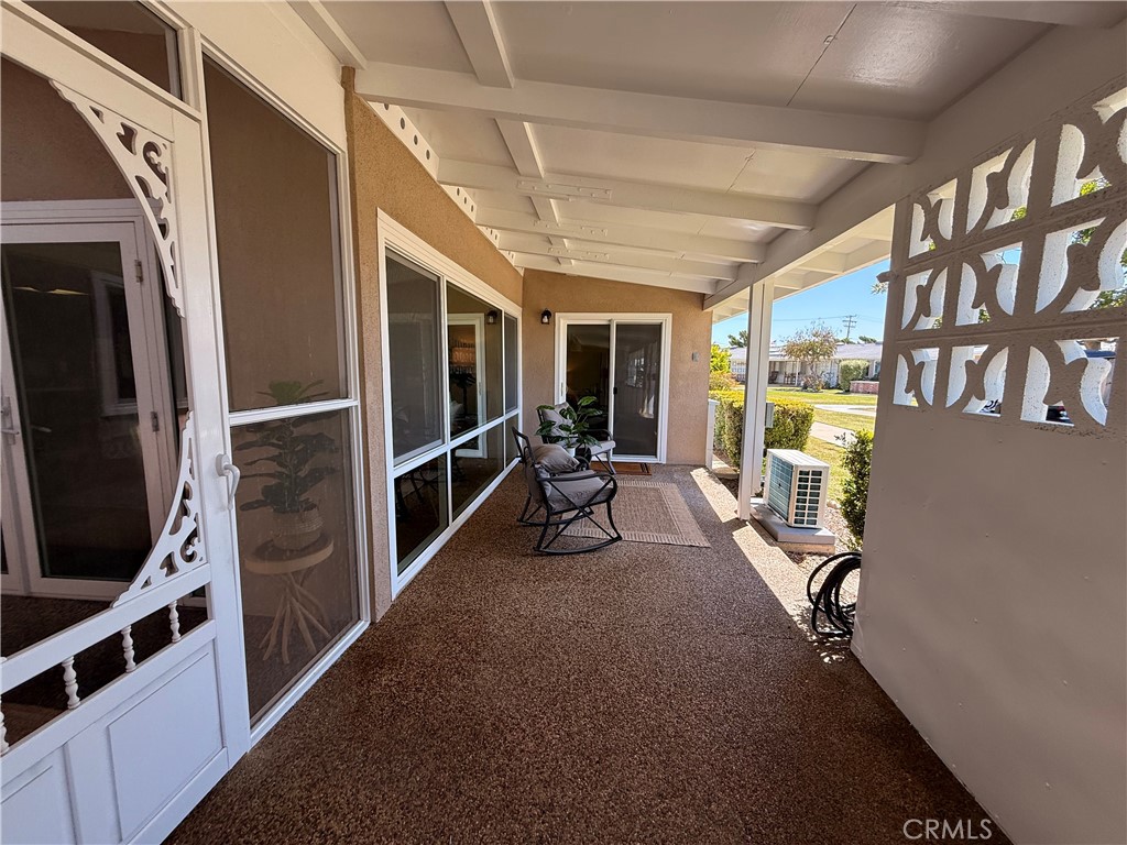 13560 Medinac Lane, Unit 102B Seal Beach, CA 90740 - Photo 20 of 24 a view of a room with gym equipment