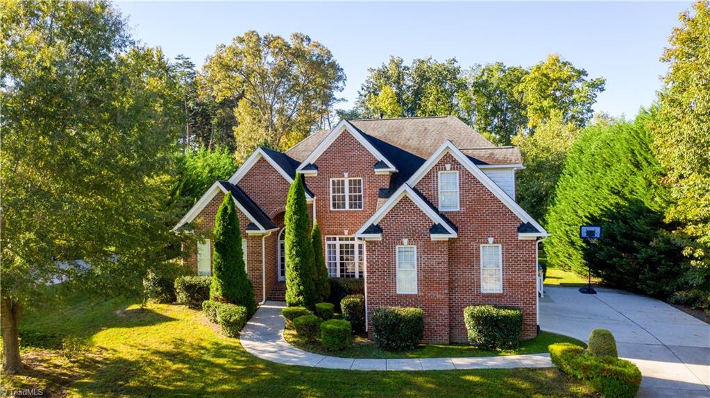 8911 Grove Park Drive Oak Ridge, NC 27310 - Photo 1 of 32