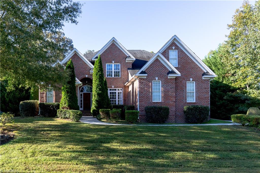 8911 Grove Park Drive Oak Ridge, NC 27310 - Photo 2 of 32