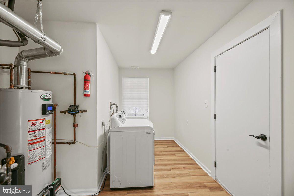 19 Intrepid Drive Sewell, NJ 08080 - Photo 17 of 47 a utility room with dryer and washer