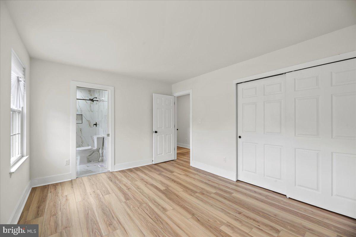 19 Intrepid Drive Sewell, NJ 08080 - Photo 20 of 47 a view of an empty room with wooden floor
