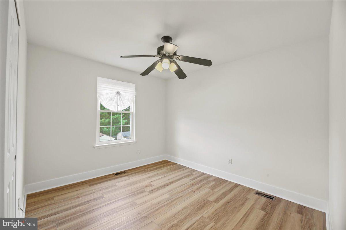 19 Intrepid Drive Sewell, NJ 08080 - Photo 24 of 47 wooden floor in an empty room with a window