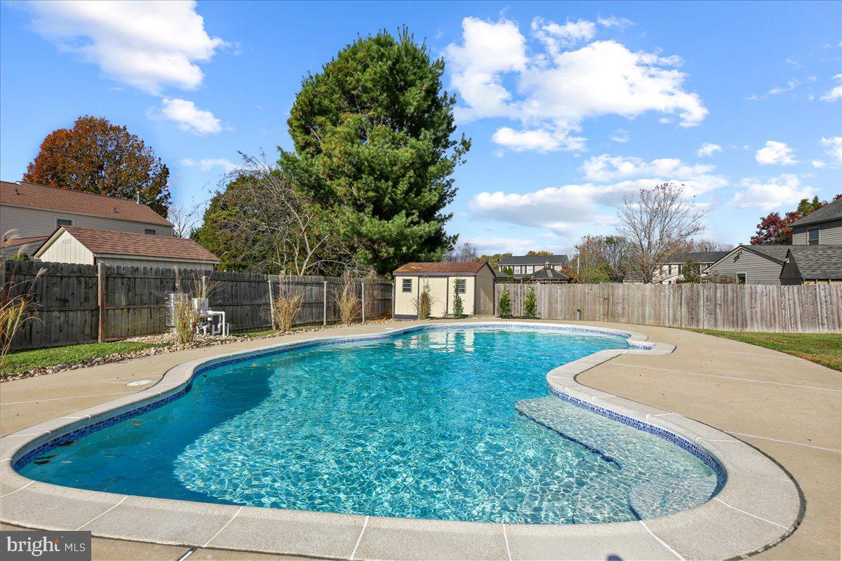 19 Intrepid Drive Sewell, NJ 08080 - Photo 27 of 47 a view of a swimming pool with a yard