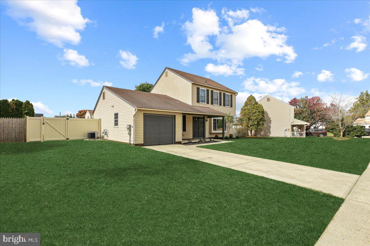 19 Intrepid Drive Sewell, NJ 08080 - Photo 3 of 47 a front view of a house with garden