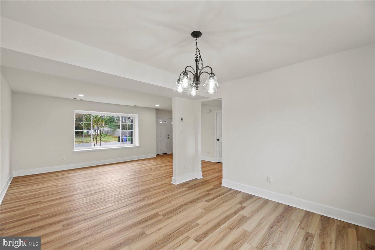 19 Intrepid Drive Sewell, NJ 08080 - Photo 8 of 47 a view of livingroom with hardwood floor and window