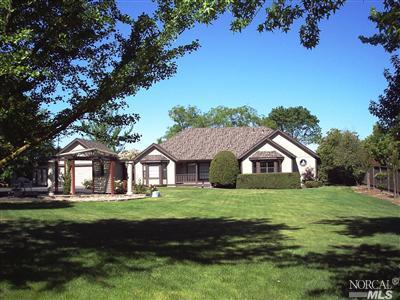 471 Sierra Vista Road Santa Rosa, CA 95401 - Photo 1 of 1 a front view of a house with a yard